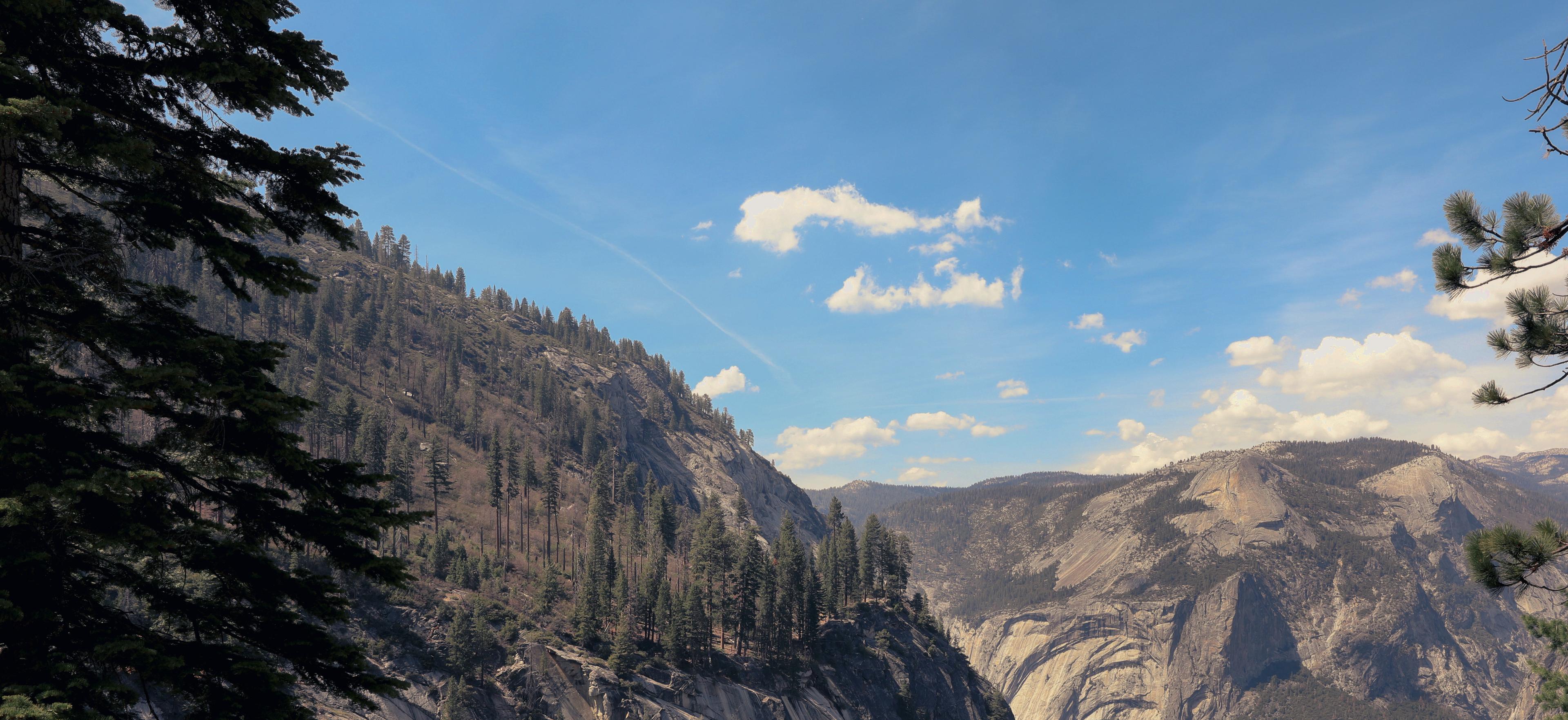 a mountainside view of yosemite national park in daytime